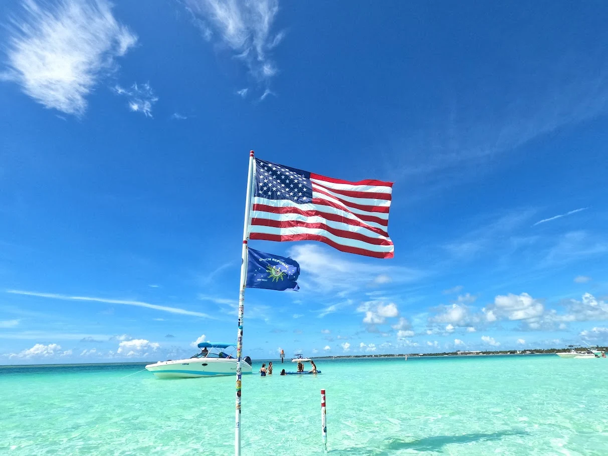 American flag and crystal clear waters of Islamorada