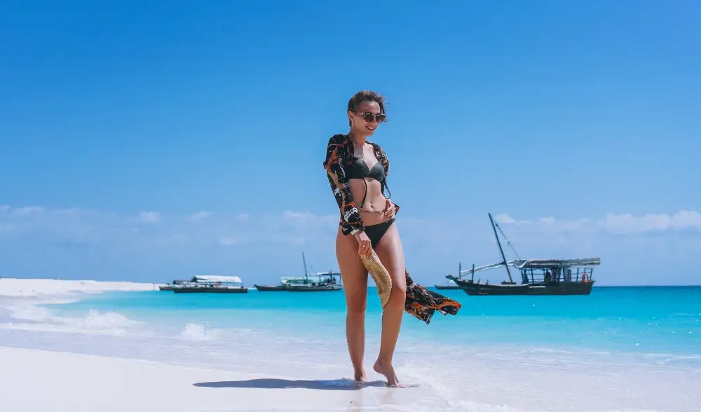 Beautiful woman on a vacation by the ocean.
