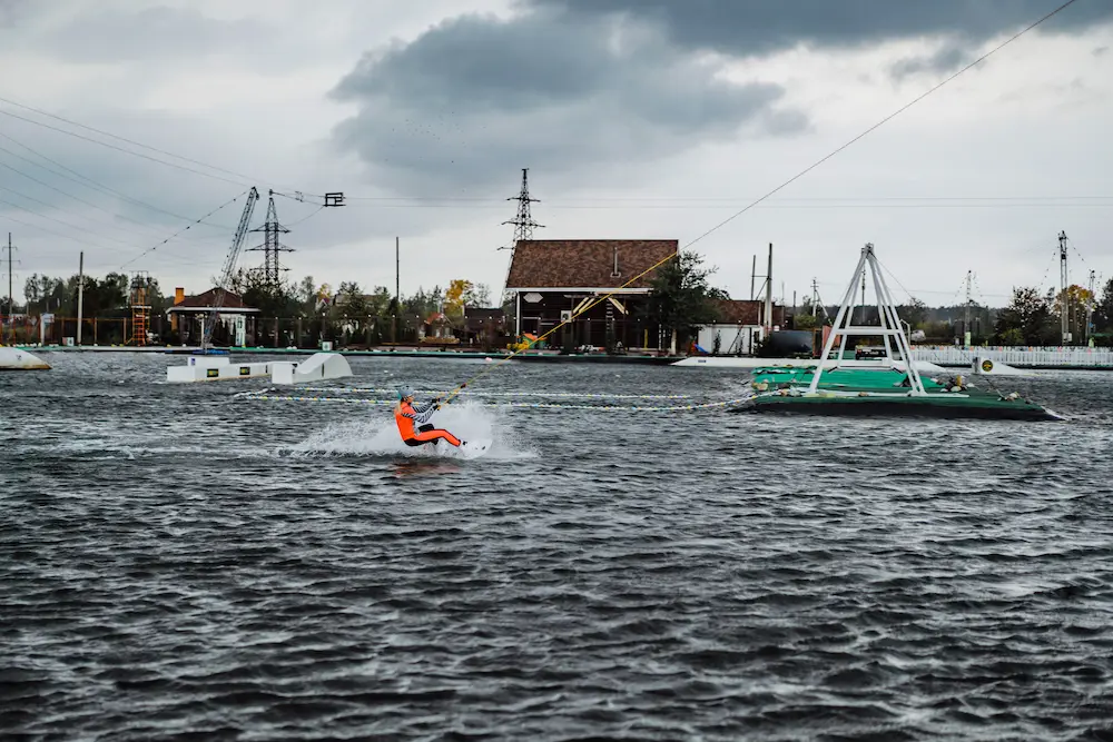 Boat navigating safely under cloudy skies on the water