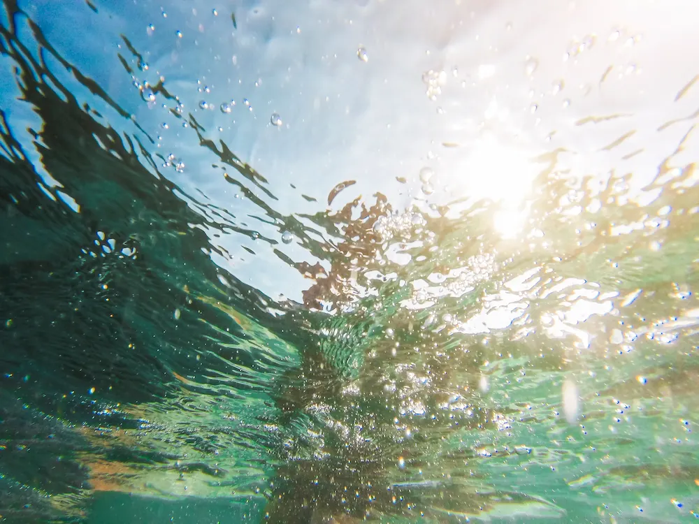 Crystal clear turquoise water with excellent underwater visibility